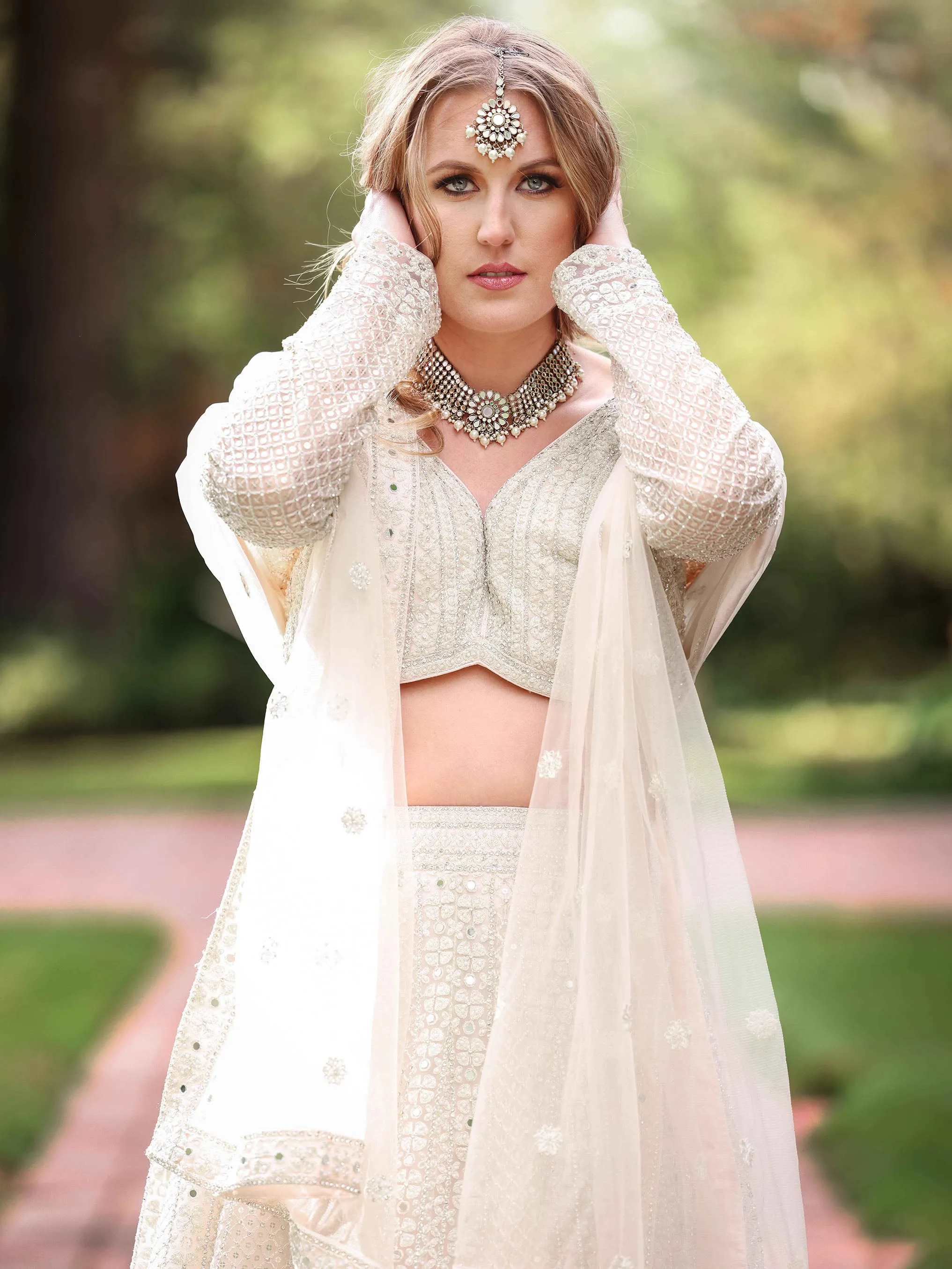 Adoring Wedding Wear Hand Embroidered White Bridal Lehenga - Rent