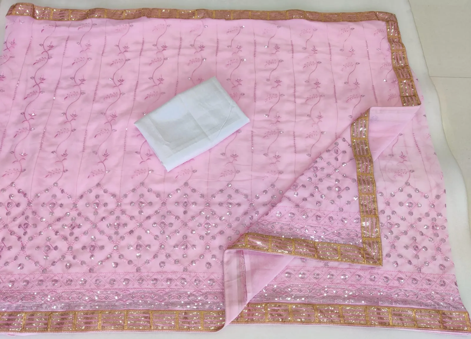 Attractive Baby Pink Colored Georgette Embroidery And Sequins Work With Lace Border Saree