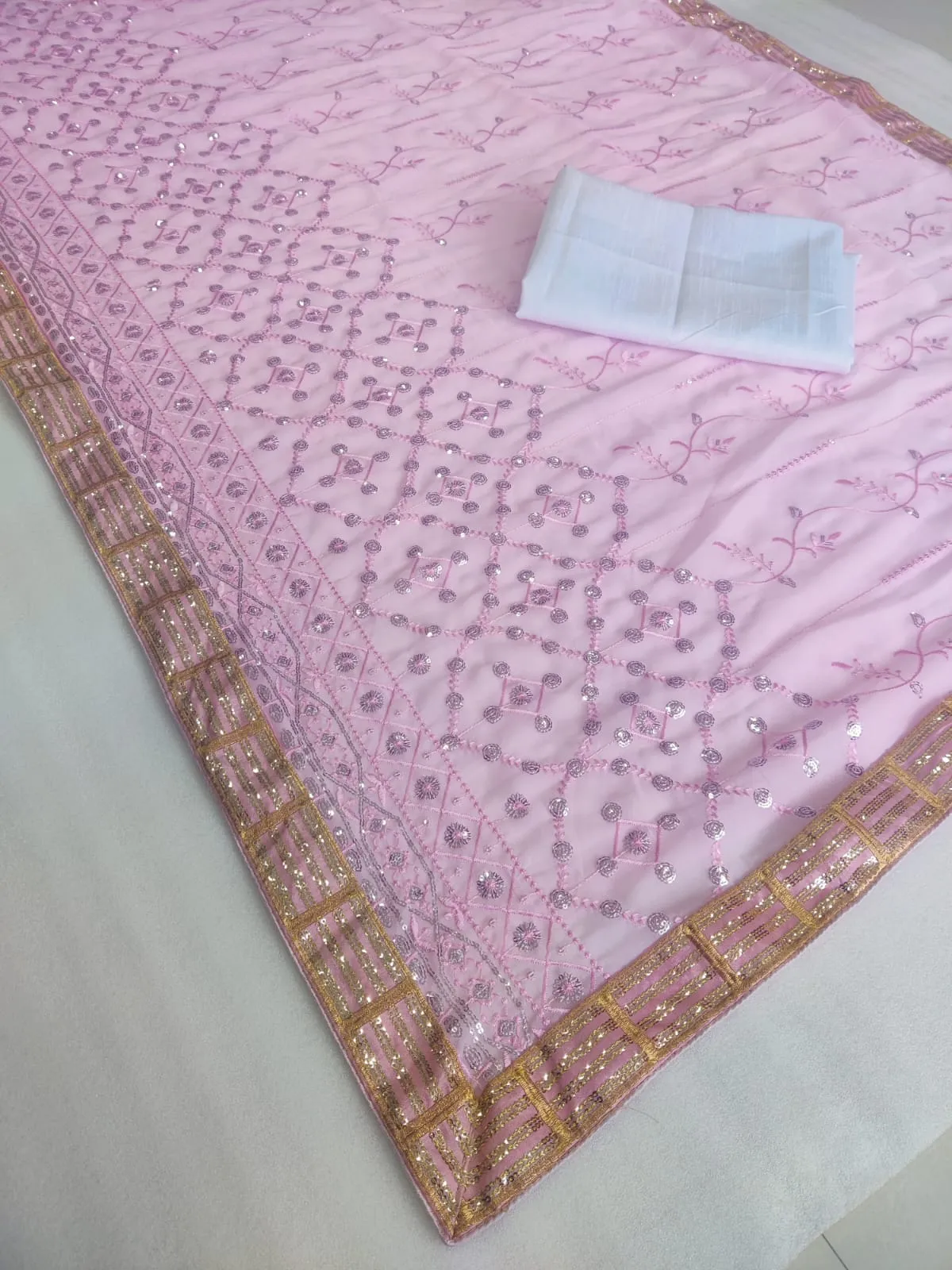 Attractive Baby Pink Colored Georgette Embroidery And Sequins Work With Lace Border Saree