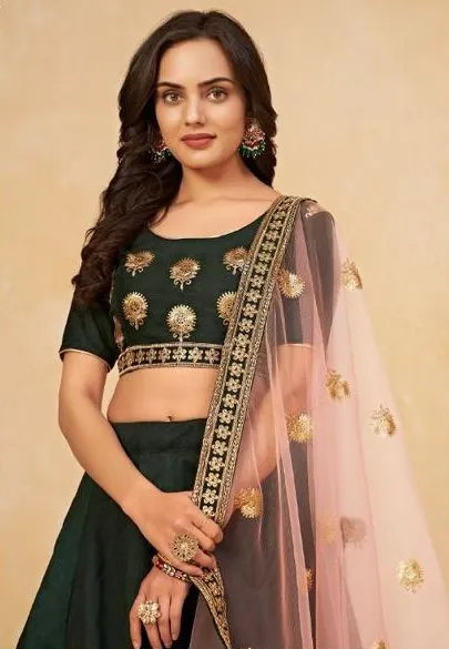 Beautiful Dark Green colored Heavy embroidered Lehenga Set - Rent