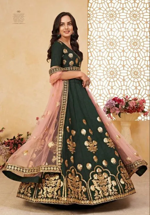 Beautiful Dark Green colored Heavy embroidered Lehenga Set - Rent