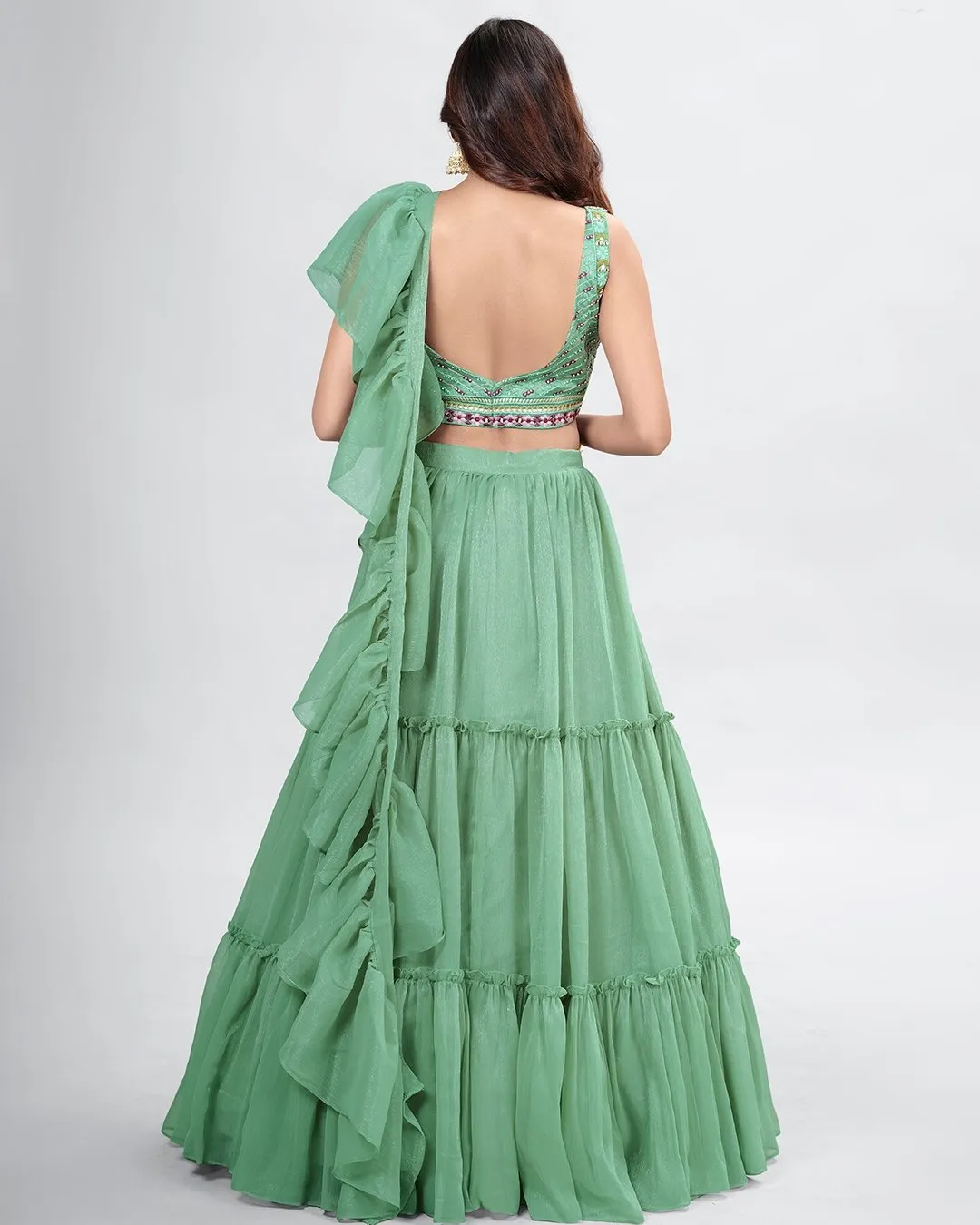 Beautiful green colored printed Lehenga Set - Rent