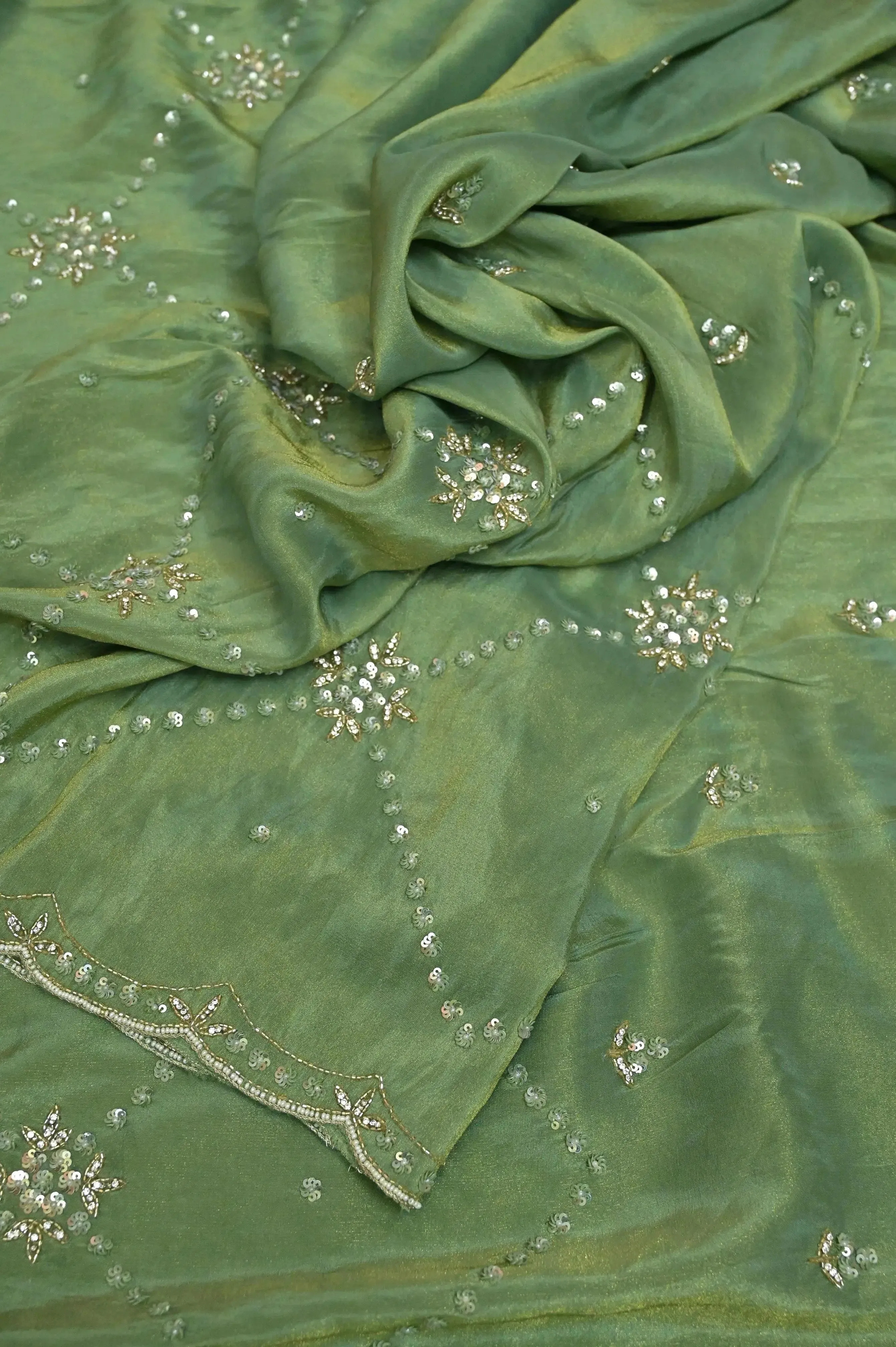 Elaichi Green Color Georgette Tissue Saree with Hand Zardozi Work and Scallop Border