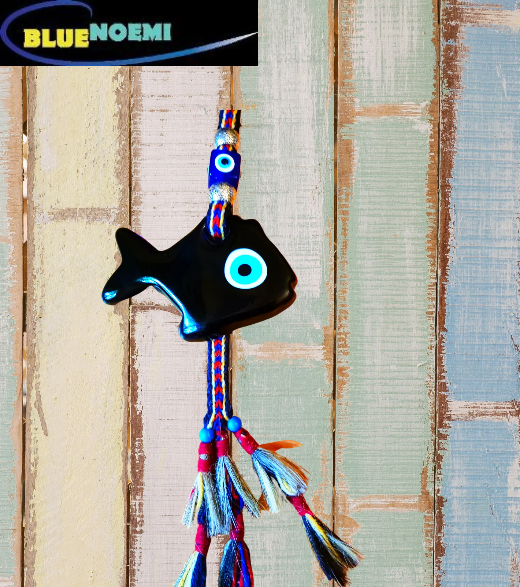 Glass Wall Hanging Fish Blue Eyes Symbols on a colourful rope.