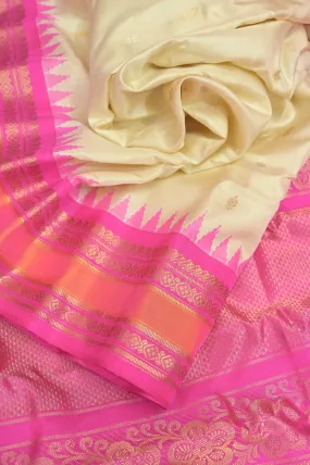 Off white and Pink Color Gadwal Silk Saree with Allover Silver and Golden Zari Butta Work