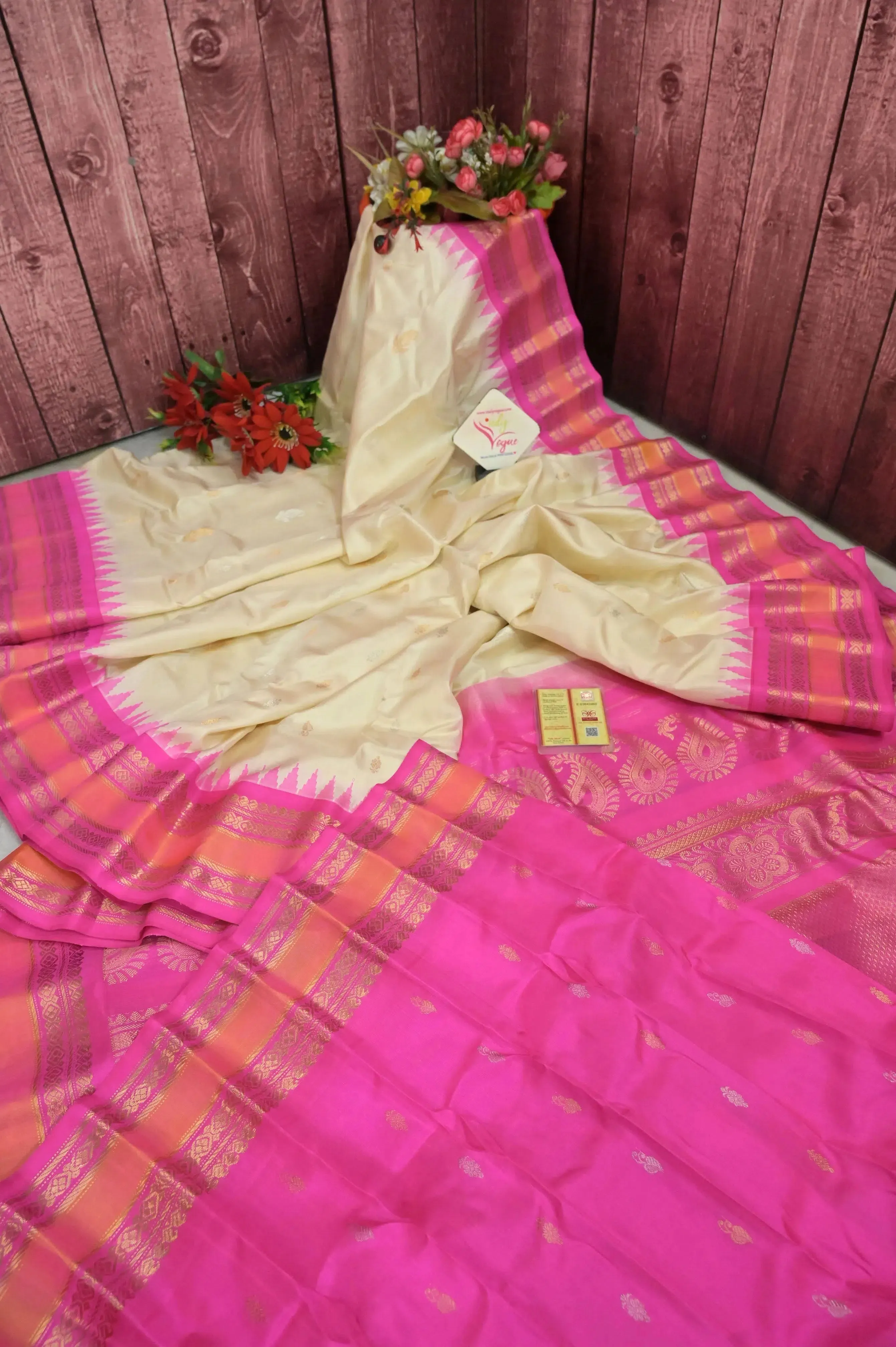 Off white and Pink Color Gadwal Silk Saree with Allover Silver and Golden Zari Butta Work