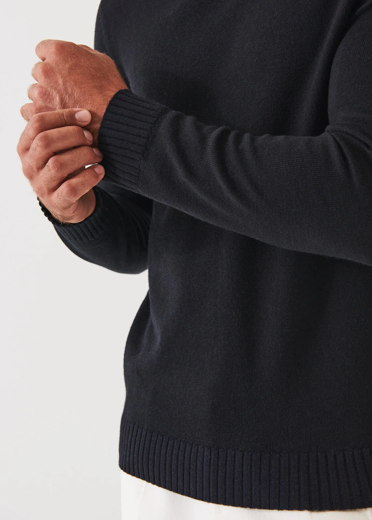 PLAITED MERINO WOOL TURTLENECK